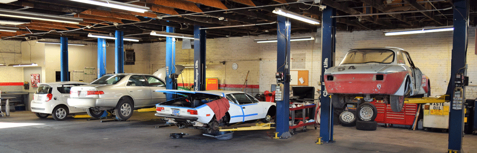 Trusted Auto Repair - Cars In Bays Banner